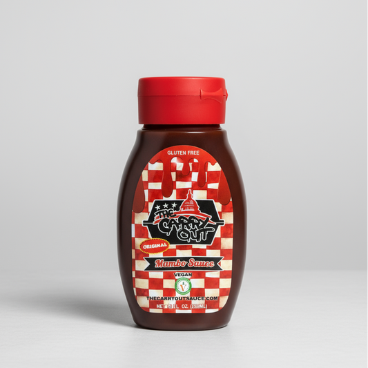 Bottle of Mambo Sauce with a red cap